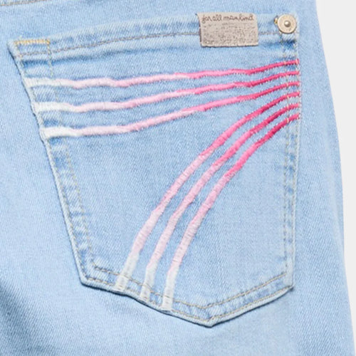 Close-up of faded pink 7 back pocket on 7 For All Mankind Air Haze Dojo light wash jeans – Seven Acres Canada